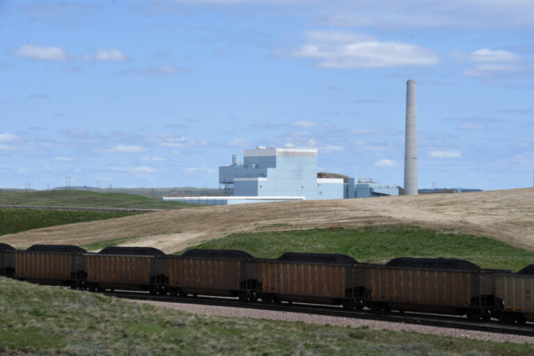 A train carrying cars loaded with coal leaving a nearby coal mine is seen in front of Dry Fork Station, a coal fired power plant operated by Basin Electric Power Cooperative on Monday May 8, 2017 in Gillette, Wyoming. Credit: Matt McClain/The Washington Post via Getty Images