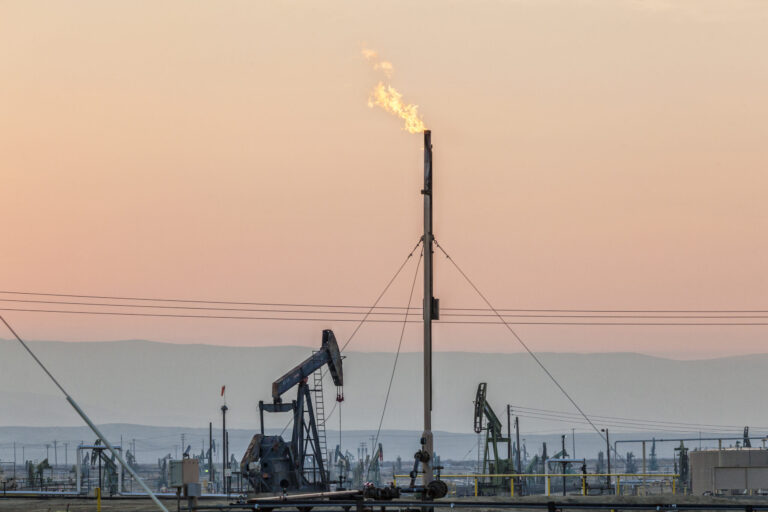 Flares burning off gas at Belridge Oil Field and hydraulic fracking site which is the fourth largest oil field in California. Credit: Citizens of the Planet/Education Images/Universal Images Group via Getty Images