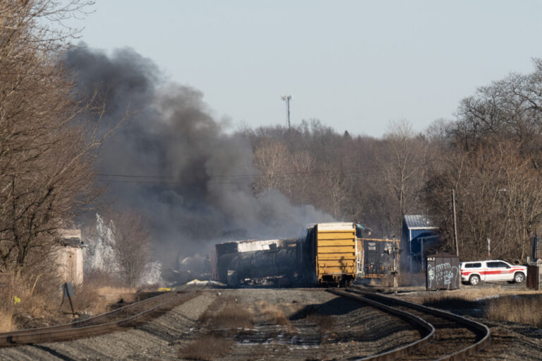 Smoke rises from a derailed cargo train in East Palestine, Ohio, on February 4, 2023. The train accident sparked a massive fire and evacuation orders, officials and reports said Saturday. Credit: Dustin Franz/AFP via Getty Images