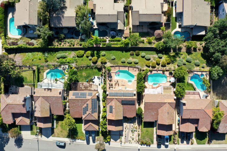 An aerial view of homes in one of the many cities in Southern California where residents will be limited to one day per week of outdoor watering on May 6, 2022 in Agoura Hills, California. A water shortage emergency was declared in Southern California with water restrictions for 6 million residents amid drought conditions. Credit: Mario Tama/Getty Images