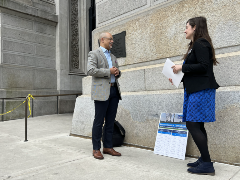 State Rep. Chris Rabb, a Philadelphia Democrat, and Stephanie Wein, a water and conservation advocate at PennEnvironment, a Philadelphia-based advocacy group talk after a press conference at city hall. Credit: Victoria St. Martin