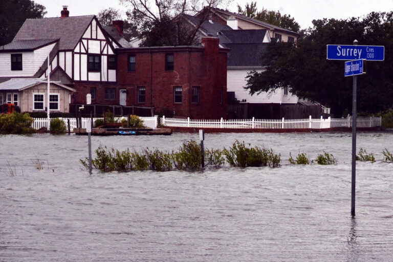 Tidal flooding fills streets in Norfolk, Virginia on Monday October 3, 2022. Credit: Jim Morrison for The Washington Post via Getty Images