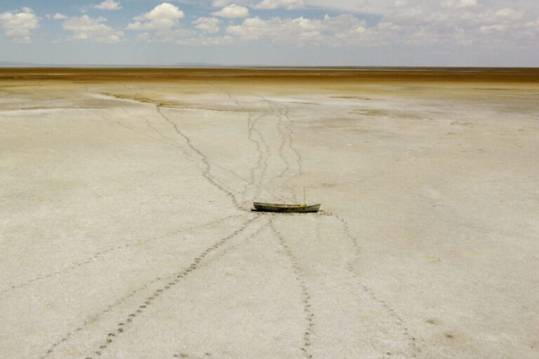 Aerial view of an abandoned boat on a desert at the site of former Lake Poopó, near Punaca Tinta Maria, Bolivia, taken on October 15, 2022. Credit: Martín Silva/AFP via Getty Images