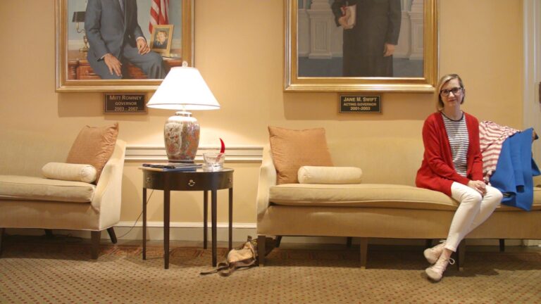 Andrea Honore sits outside former Gov. Charlie Baker's office. Photo Courtesy of Andrea Honore