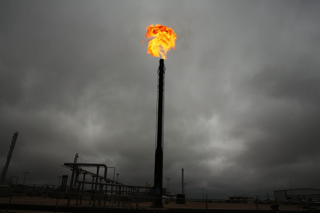 Flared natural gas is burned off at Apache Corporations operations at the Deadwood natural gas plant in the Permian Basin on Feb. 5, 2015 in Garden City, Texas. Credit: Spencer Platt/Getty Images