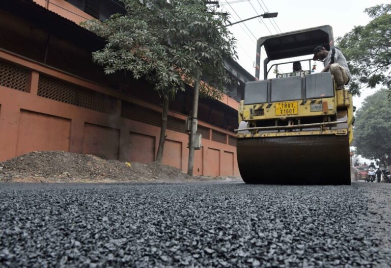 A worker involved in making the first road constructed with plastic waste in Agartala, the capital city of India's northeastern state of Tripura, on Jan. 29, 2021. Credit Xinhua/Stringer via Getty Images