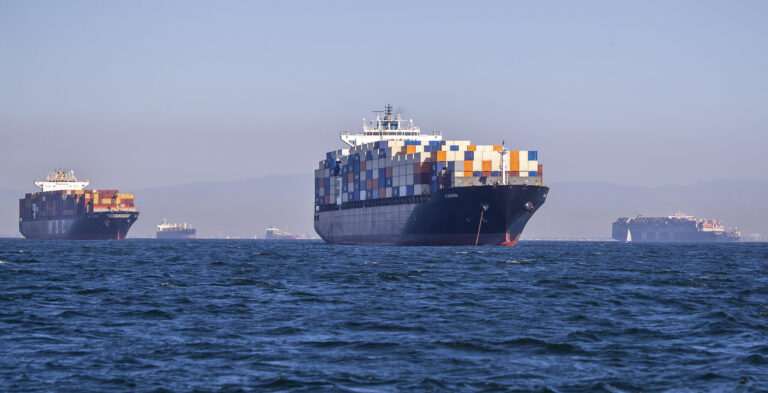 Container ships siting off the coast of the Ports of Los Angeles and Long Beach, waiting to be unloaded. Credit: Allen J. Schaben/Los Angeles Times via Getty Images