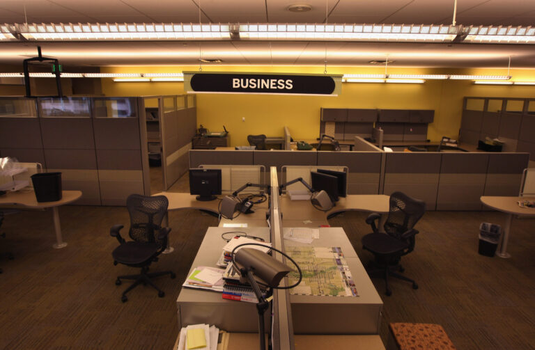 In Denver, the newsroom of the Rocky Mountain News sits empty in February 2009 after publication of the newspaper's last edition. The owner E.W. Scripps Co. announced that the "Rocky" was closing down after efforts to sell the money-losing newspaper failed. Credit: John Moore/Getty Images.