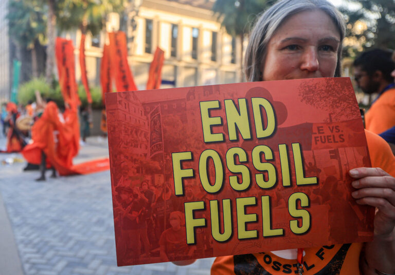 Activists protest against fossil fuels on the sidelines of the COP28 United Nations climate summit in Dubai on Tuesday. Credit: Karim Sahib/AFP via Getty Images)