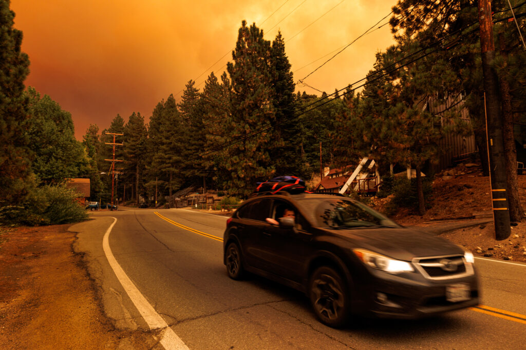 Residents flee Green Valley Lake, California, under a mandatory evacuation order as the Line Fire burns through the San Bernardino National Forest on Sept. 10. Credit: Gina Ferazzi/Los Angeles Times via Getty Images