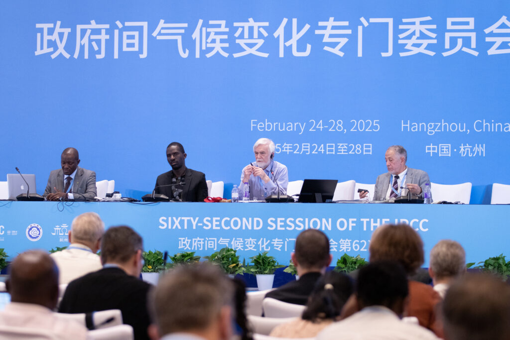 IPCC Chair Jim Skea leads a panel during the 62nd Session of the Intergovernmental Panel on Climate Change earlier this year in Hangzhou, China. Credit: IPCC Secretariat