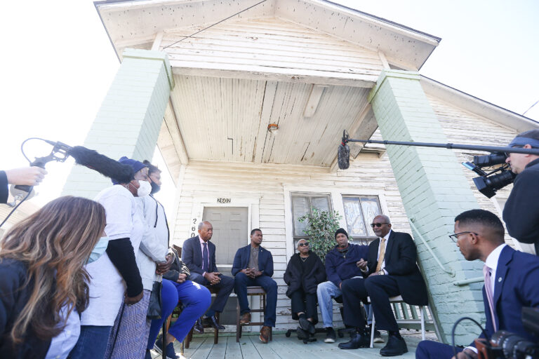 In 2021, Dr. Robert Bullard, from right, talks with Fifth Ward residents Water Mallett, Doris Brown, then-EPA Administrator Michael S. Regan and Houston Mayor Sylvester Turner during Regan's tour of Houston to highlight environmental justice concerns. Credit: Elizabeth Conley/Houston Chronicle via Getty Images