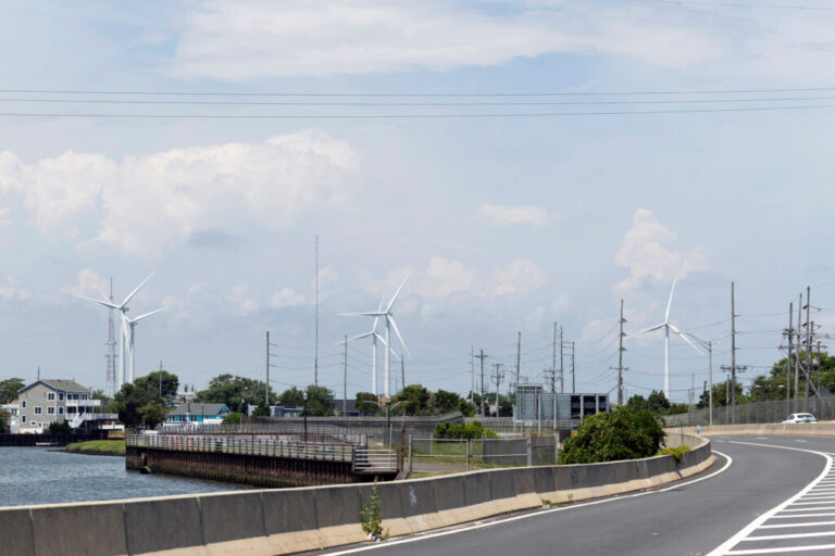 Wind turbines are visible from the highway in Atlantic City, N.J. Credit: Rachel Wisniewski/The Washington Post