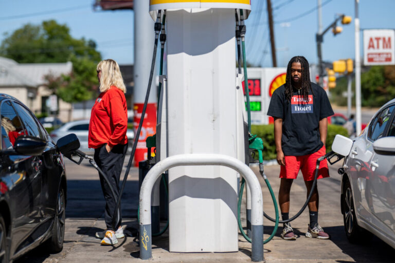 People pump gas at a station on Aug. 03, 2023, in Austin, Texas. Credit: Brandon Bell/Getty Images