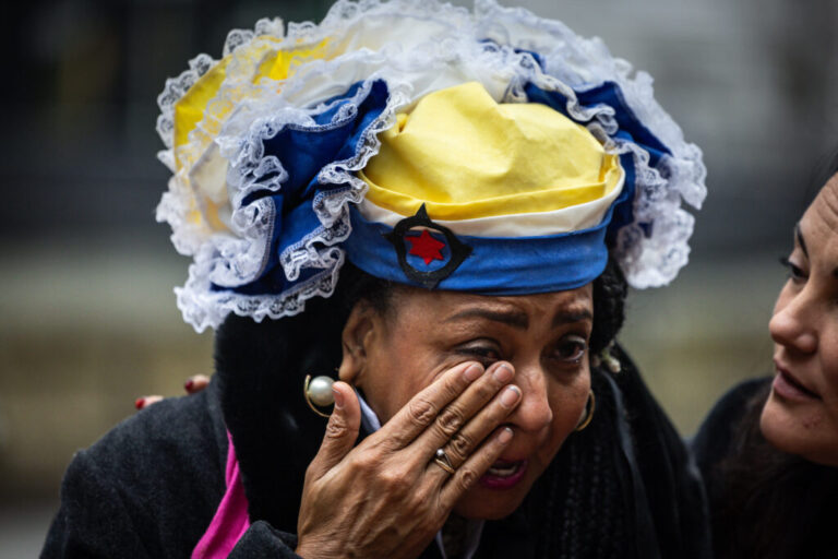 A Bonaire resident sheds a tear before the Hague District Court ruled that the Netherlands breached human rights on Jan. 28. Credit: Laurens Van Putten/ANP/AFP via Getty Images