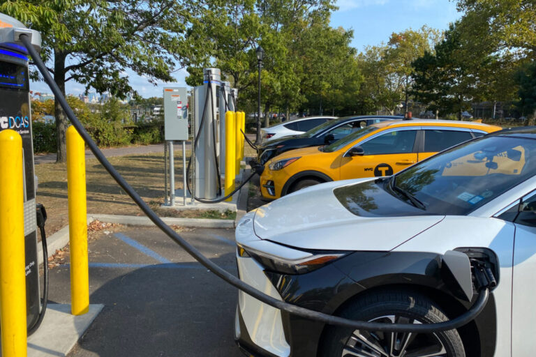 Electric vehicles charge at a parking lot in the Queens boroughs of New York City. Credit: Lindsey Nicholson/UCG/Universal Images Group via Getty Images