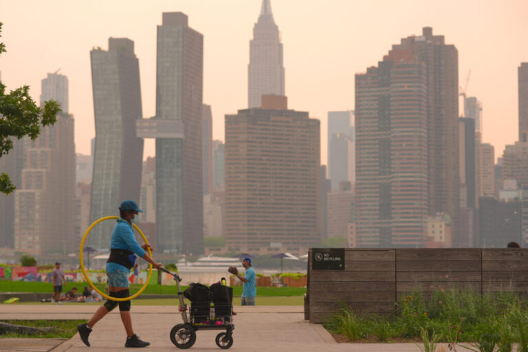 A thick haze blankets New York City as smoke from Canadian wildfires impacts air quality in the region on Aug. 5, 2025. Credit: Selcuk Acar/Anadolu via Getty Images