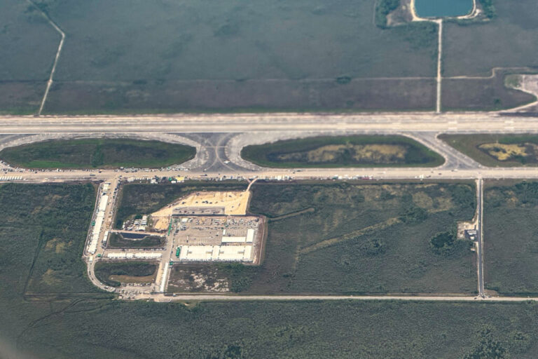 An aerial view of the migrant detention center known as Alligator Alcatraz in Ochopee, Fla. Credit: Chandan Khanna/AFP via Getty Images