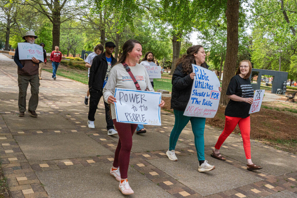 Protestors march from Birmingham's Kelly Ingram Park toward Alabama Power’s Birmingham headquarters on Monday. Credit: Lee Hedgepeth/Inside Climate News