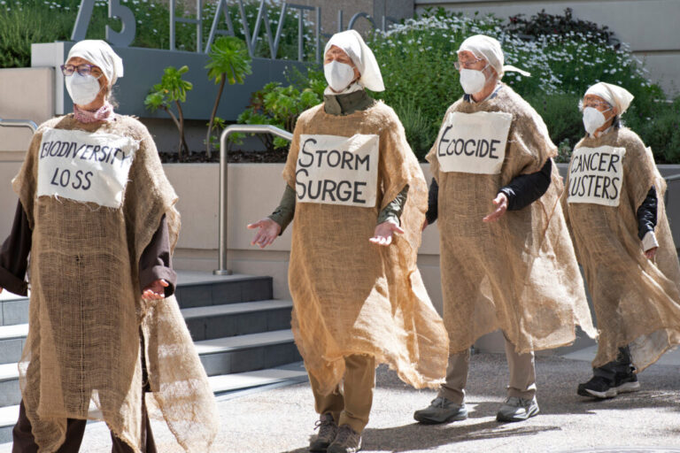 “Lamentors” wear sackcloth and ash, mourning the Trump administration’s decision to overturn a landmark climate regulation rule, outside EPA Region 9 headquarters in San Francisco on Tuesday. Credit: ProBonoPhoto.org/Rachel Podlishevsky