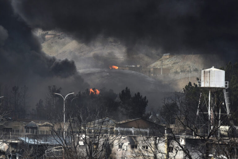 Plumes of smoke rise over oil depot tanks hit by a joint Israel-U.S. attack on March 8 in Tehran, Iran. Credit: Kaveh Kazemi/Getty Images