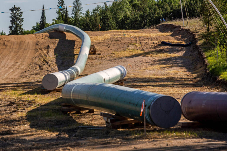 Sections of the Enbridge Line 3 oil pipeline are seen at the construction site near Wauburn, Minn., on June 5, 2021. Credit: Kerem Yucel/AFP via Getty Images