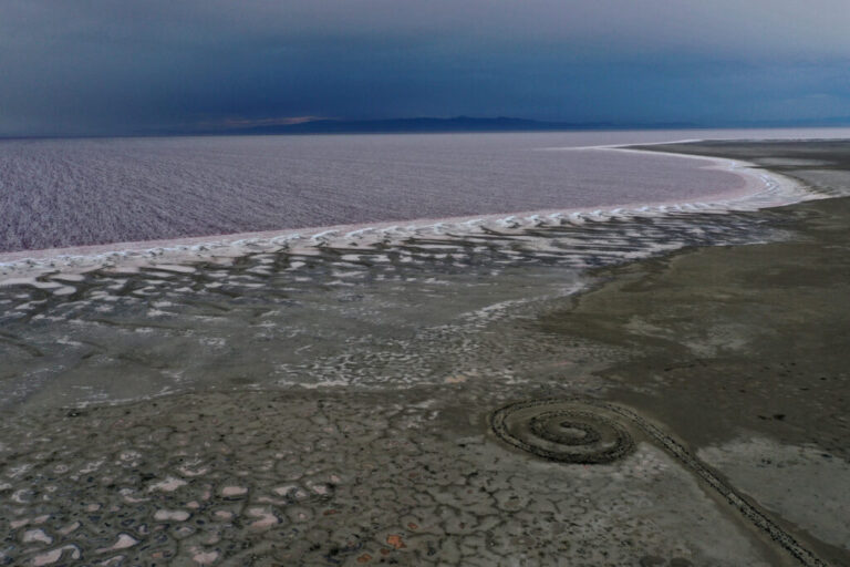 The Spiral Jetty, constructed by artist Robert Smithson in 1970, sits near the Great Salt Lake’s water on Aug. 1, 2021 in Utah. Credit: Justin Sullivan/Getty Images