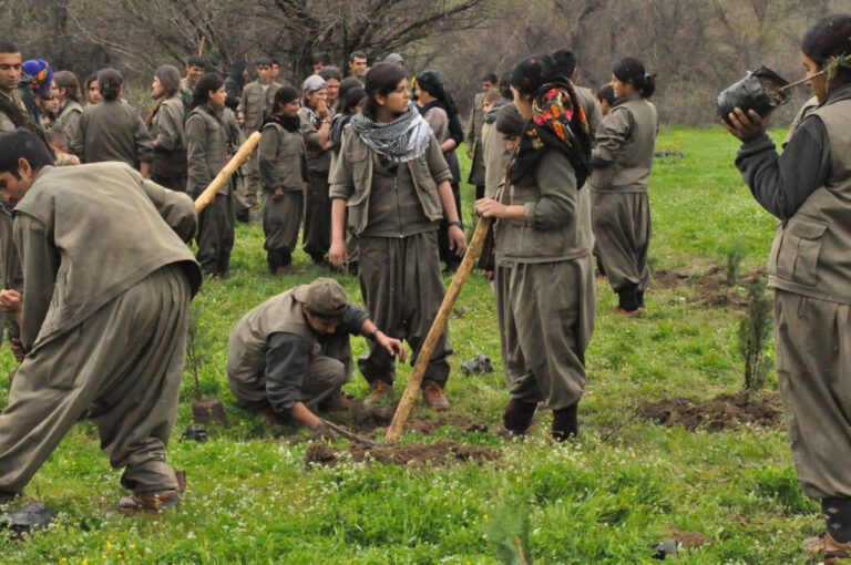 Kurdistan Workers’ Party fighters plant trees in the Qandil Mountains. Experts see an opportunity for environmental restoration after a long conflict between the group and Turkey ended last year. Credit: Kurdishstruggle/CC BY 2.0